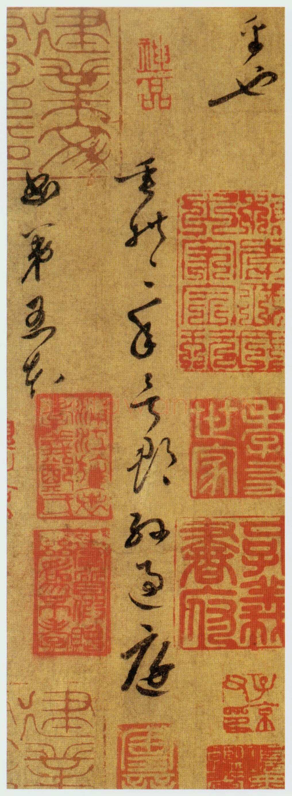 孙过庭《草书千字文第五本卷》白麻纸本 包首锦为宋紫钤鸾鹊谱缂丝 25.7×82.5厘米 辽宁省博物馆藏
